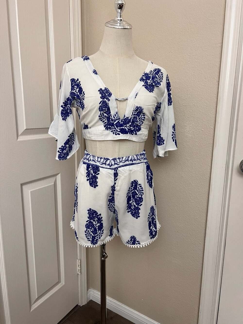White and Blue Floral Print Two-Piece Crop Top and Shorts Set with Pom-Pom Hem
